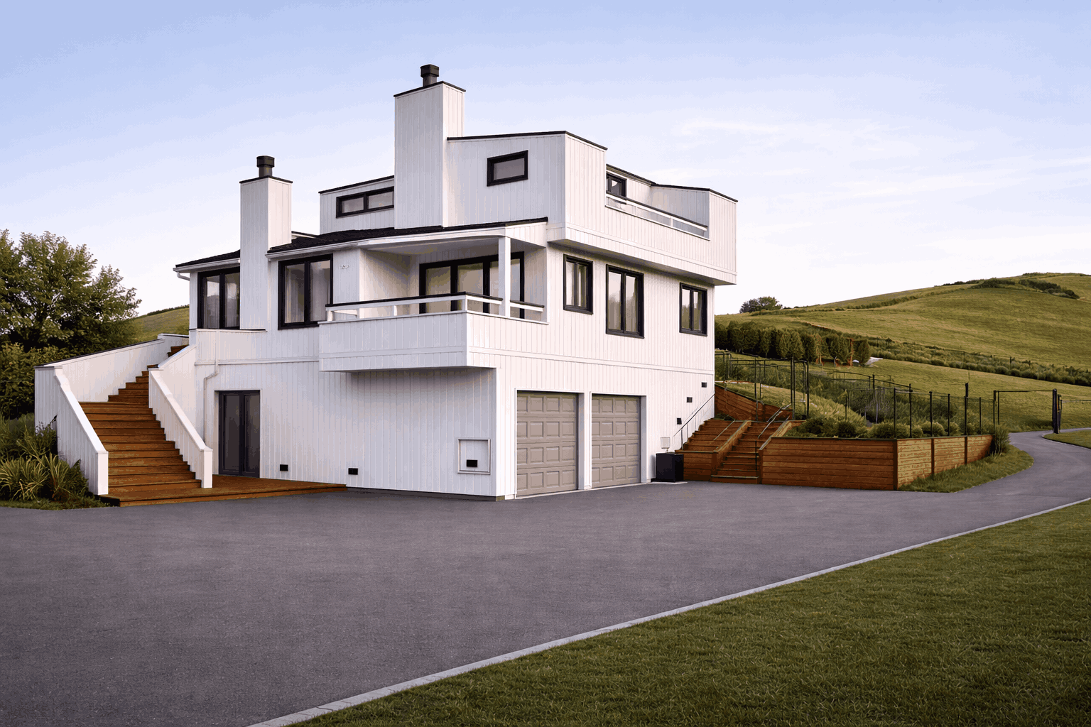 Modern coastal-style home at sunset